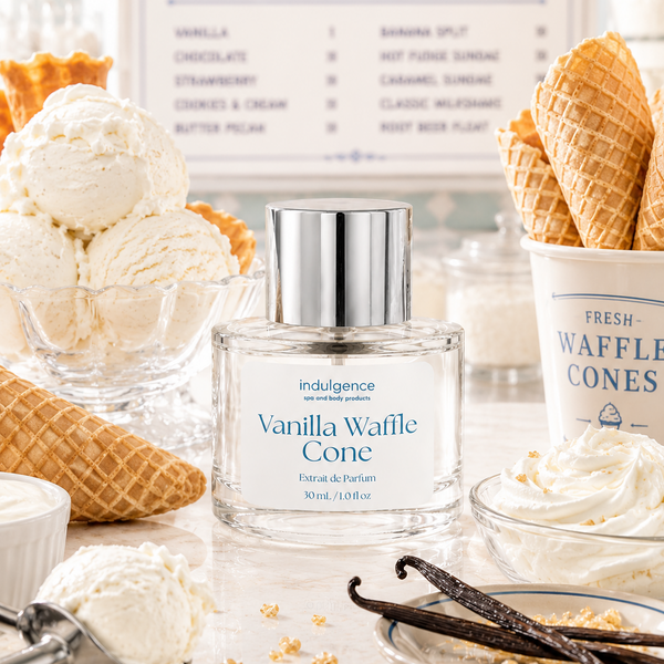 Perfume bottle labeled 'Vanilla Waffle Cone' with ice cream and waffle cones in the background.